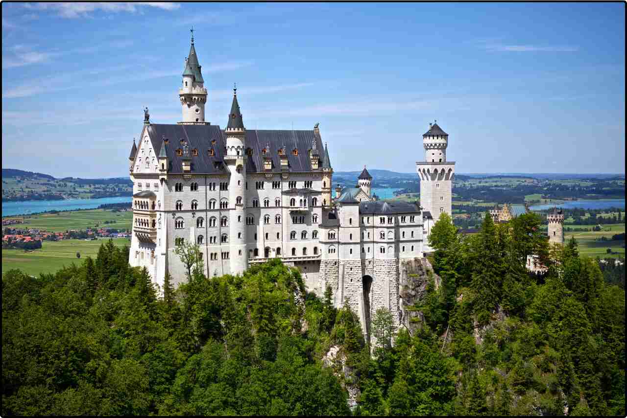 Historic stone castle in Germany castle perched on a hill, surrounded by lush green forests